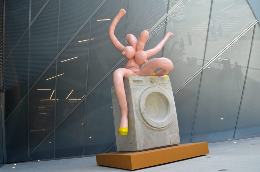 Who’s That Nude Figure on a Washing Machine Outside the New Museum?