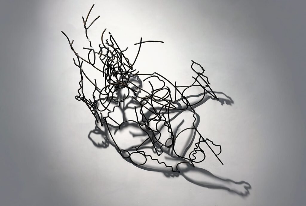 Steel And Shadows Converge in “Larry Kagan: Men”