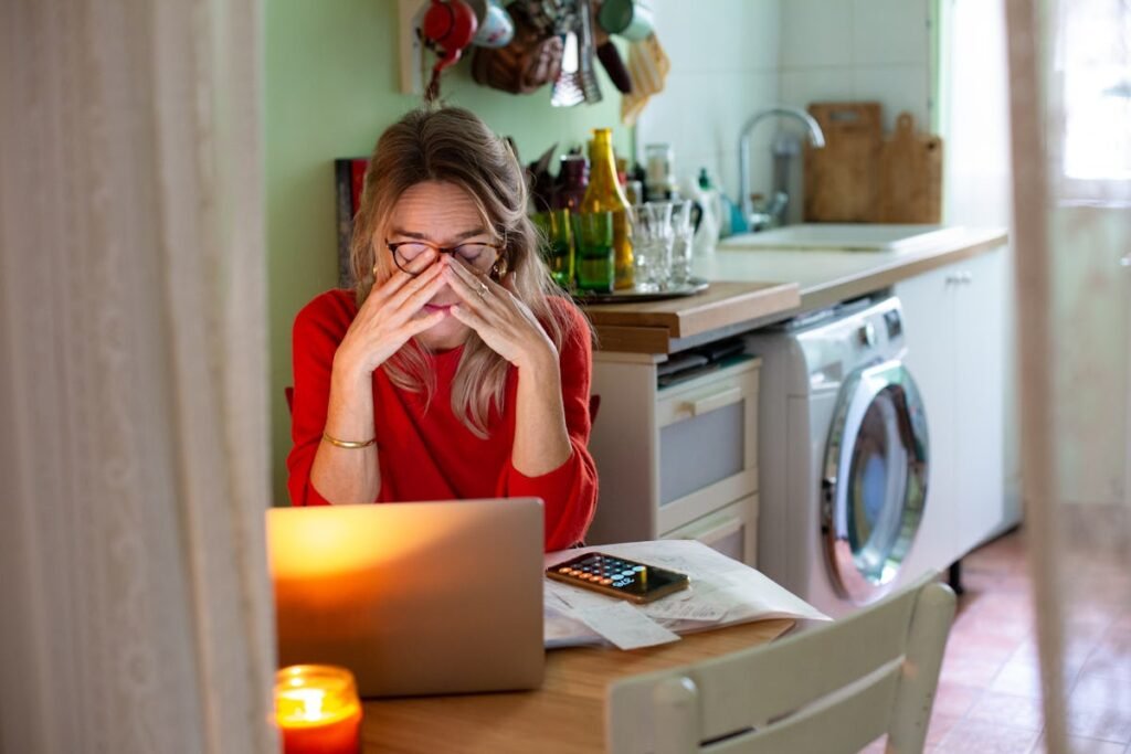 What Is "Financial Avoidance"? Experts Say Stress & Shame Play A Big Role