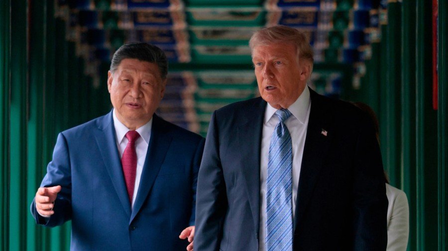 What deals did Trump make on China trip? 