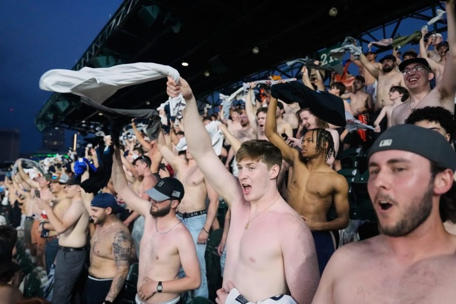 Shirtless fans become 'Tarps Off' stars at baseball stadiums