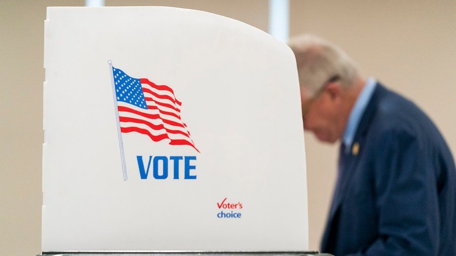 Latino voters souring on Trump, not warm toward Dems: Poll