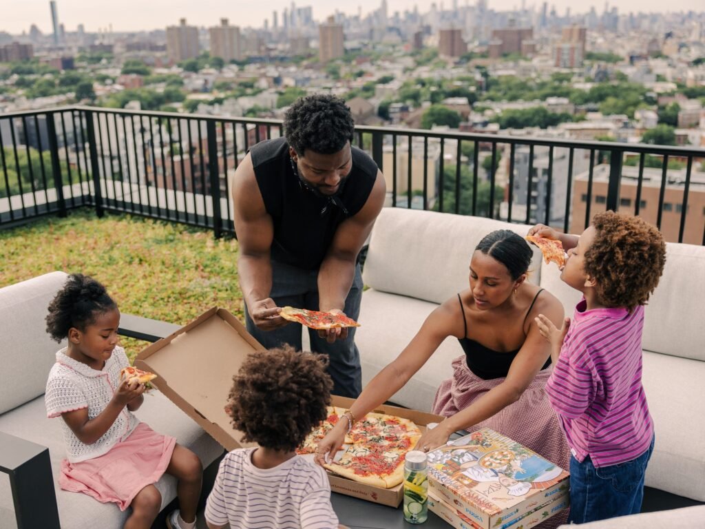 A family of 5 downsized from a Texas home to an NYC apartment. The kids share a room, but they've never been happier.