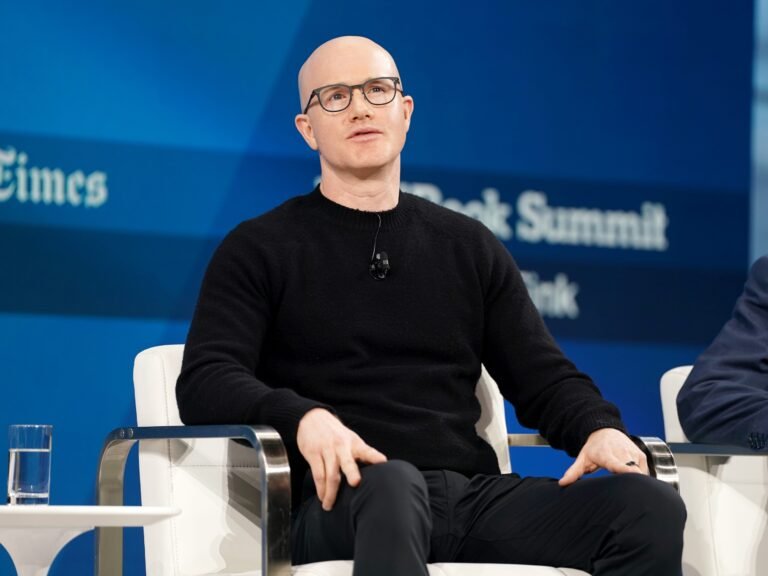The cost-saving AI measure Coinbase's CEO is taking to keep costs 'roughly flat' while growing token usage