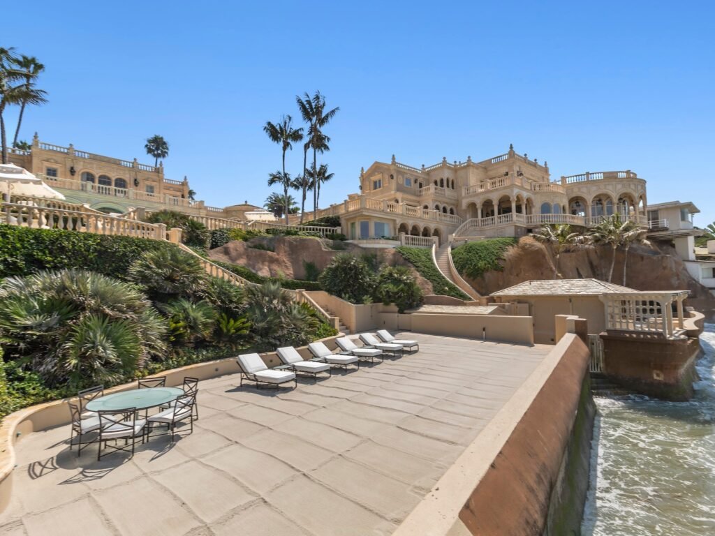 A late tech billionaire's Versailles-inspired California mansion just took a $20 million price cut to $87.5 million. See inside.