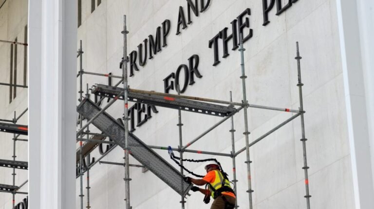 Crews begin stripping Trump name from Kennedy Center after court ruling, weather delay