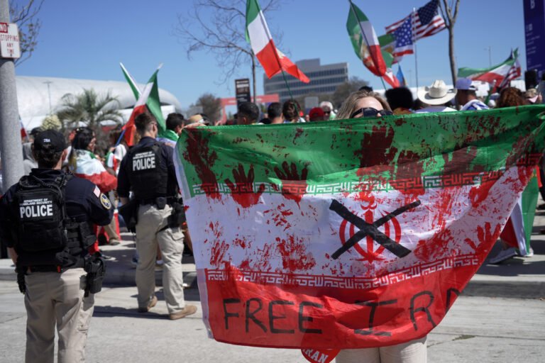 Support for Iran's team – but not for regime