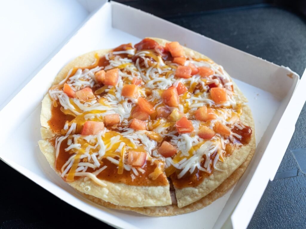 Taco Bell is making the Mexican Pizza $1 for a day. I tried the fan-favorite item, and it's worth the hype.