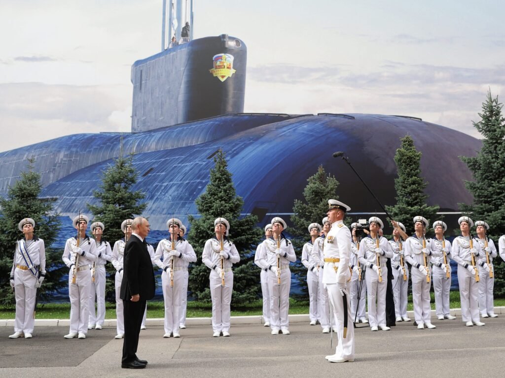 Russia replaced its once-grand Navy Day parade with a shipless event and a giant poster of a submarine