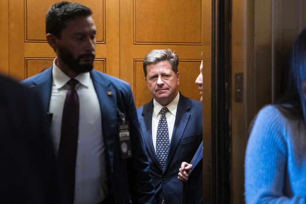 Questions about spy agency loom over Jay Clayton hearing