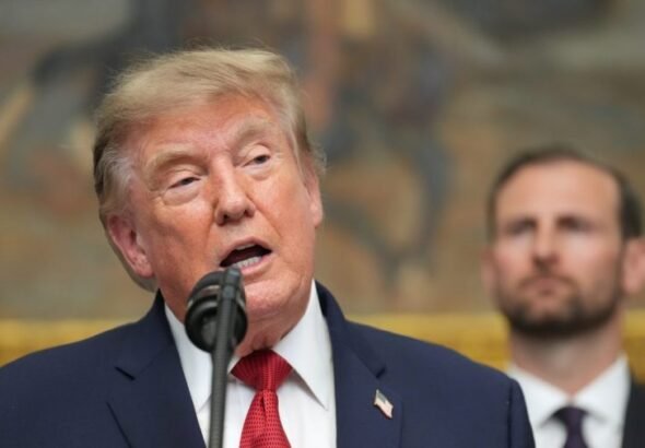 Trump plays down bond market fears, pushes interest rate cuts