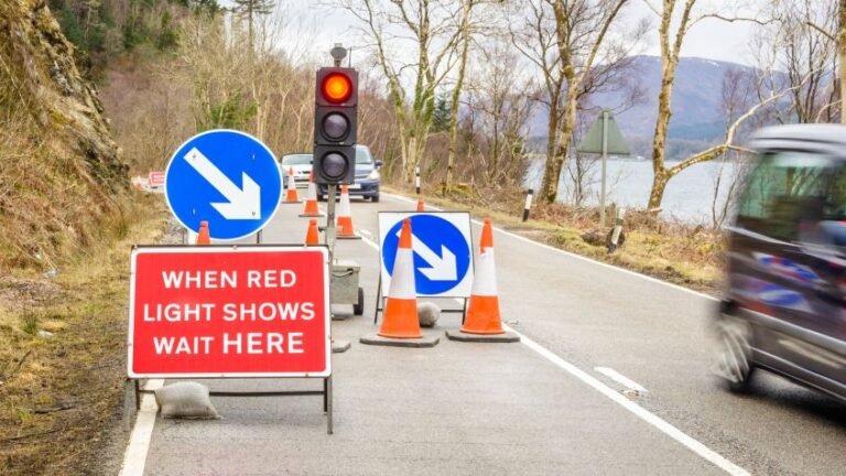 What do you do if a traffic light is stuck on red?