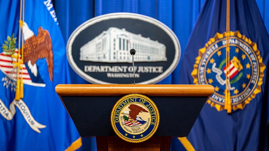 Gun law in limbo as Justice Department holds off appeal