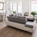 We spent over $12,000 replacing our carpets with vinyl-plank flooring. It looks very nice, but I regret it every day.