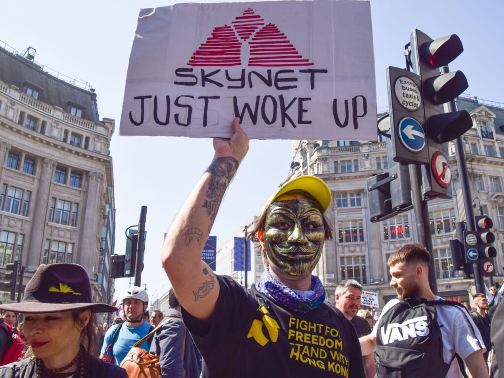 Why AI researchers keep building something they think will kill humans