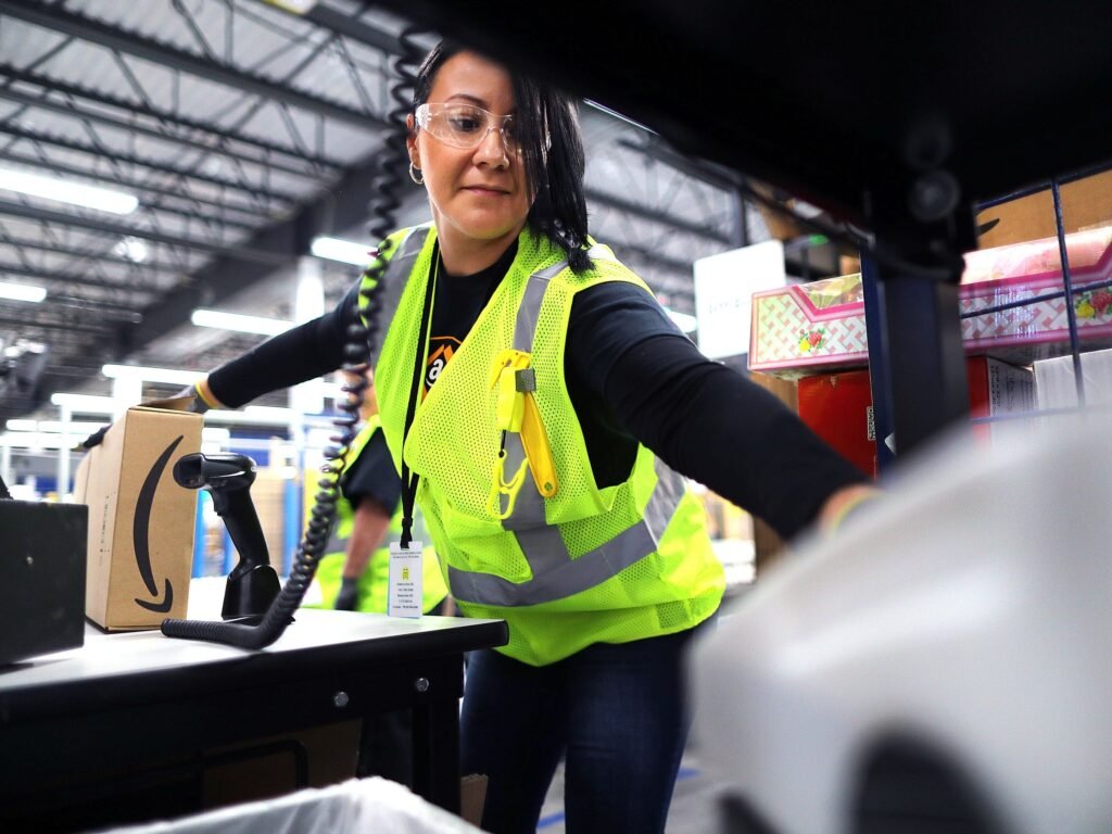 Amazon is upping its minimum hourly wage for operations workers — and offering employees a new Whole Foods discount