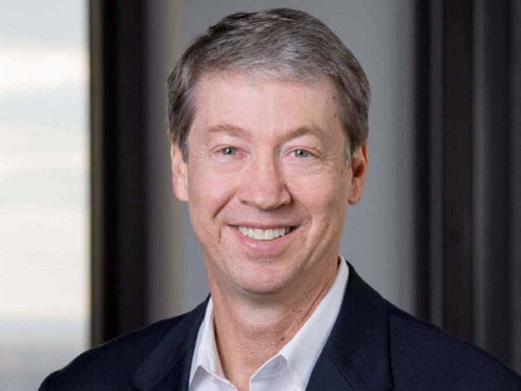 A JPMorgan veteran left to work in Detroit's government. Now he's back to help the bank's $1.5 trillion security effort.
