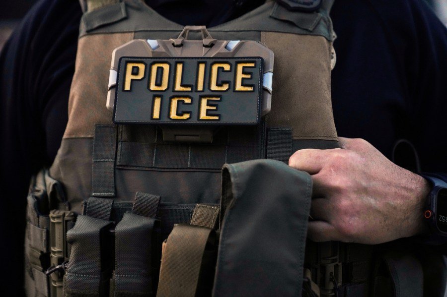 ICE officer charged with lying about shooting turns himself in: Reports