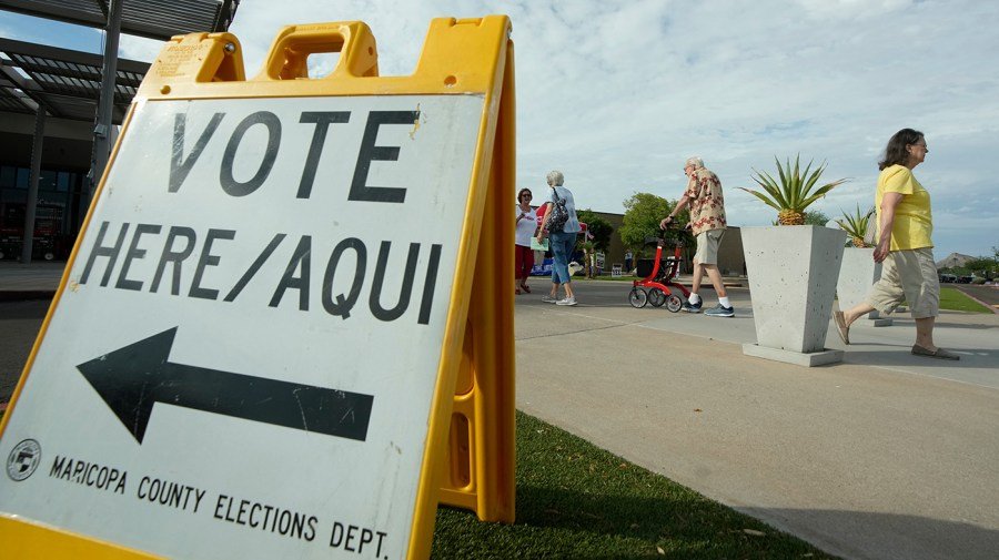Democrats sue Trump administration over threats to deploy federal agents to polls 