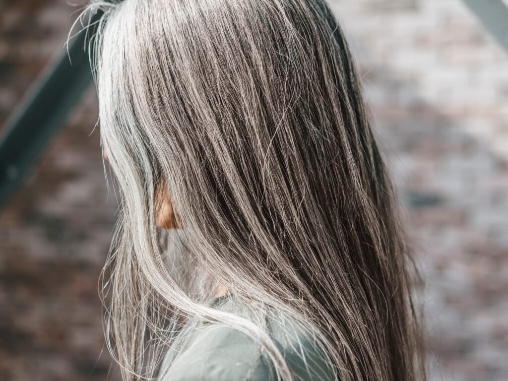 I spent $26,000 coloring my hair over the years. I'm finally going gray, and I wish I'd done it sooner.