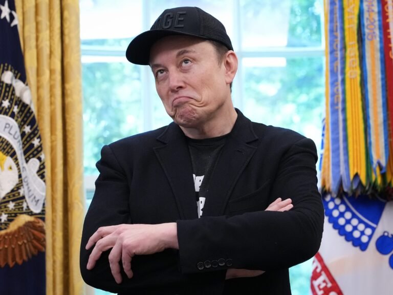 Elon Musk says 'AI and robots' are the only way to solve America's debt burden