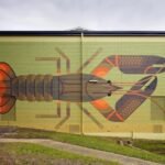 Amok Island’s Geometric Murals Teem with Vibrant Local Flora and Fauna